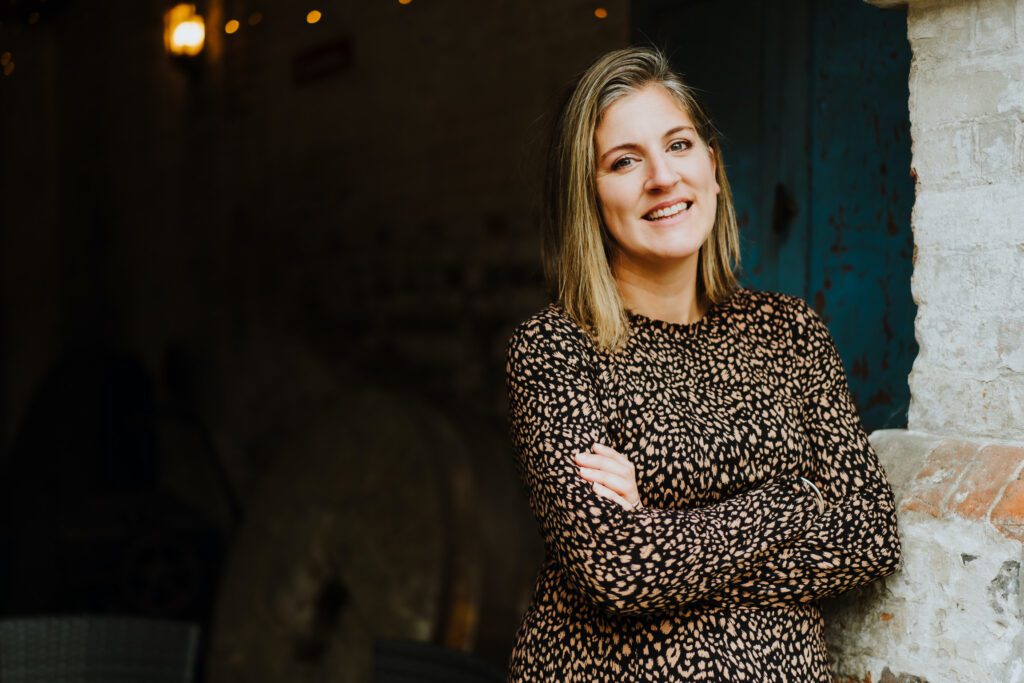 top 5 tips for pinning to pinterest. Emily from Yellow Tuxedo leaning against a brick wall